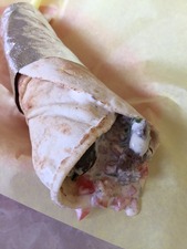 Beef Shawarma wrapped in a pita