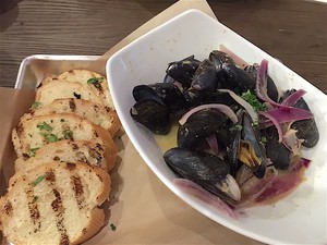 Drunken shellfish (mussels) with grilled sourdough bread