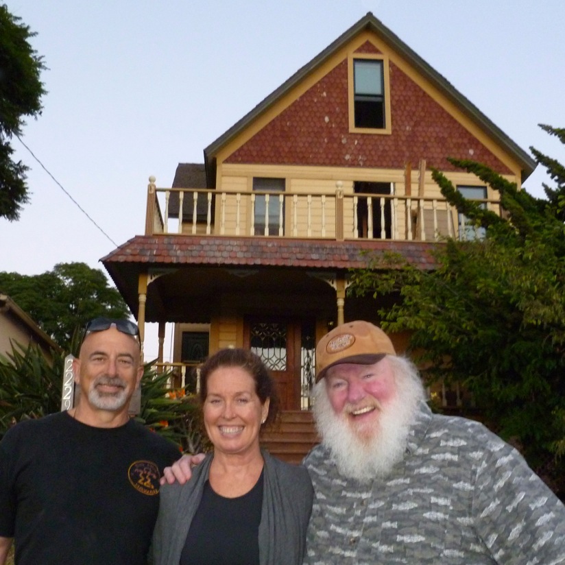 Joe and Susan Valentino with Bill Swank in front of their Bay Park home 
